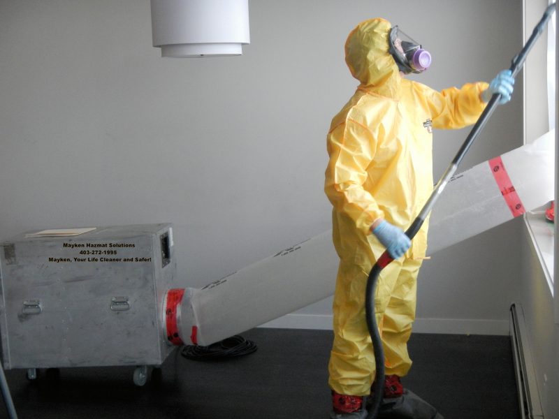 Mayken Hazmat Worker In Yellow Suit Cleaning Up Drug House