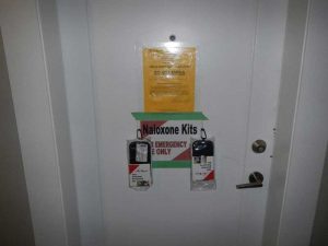 Naloxone Kit Taped To Front Of Door At Illegal Fentanyl Operation